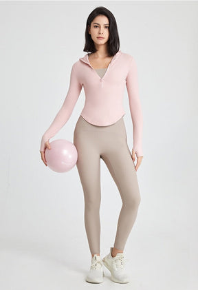 Long-sleeved fitness top with finger loops.