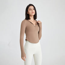 Long-sleeved fitness top with finger loops.