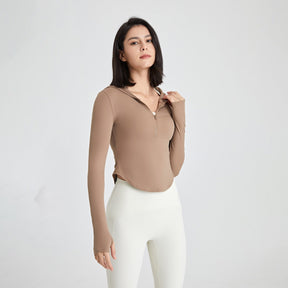 Long-sleeved fitness top with finger loops.