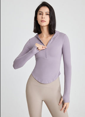 Long-sleeved fitness top with finger loops.