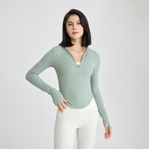 Long-sleeved fitness top with finger loops.