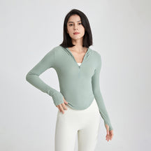 Long-sleeved fitness top with finger loops.