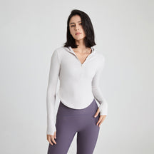 Long-sleeved fitness top with finger loops.