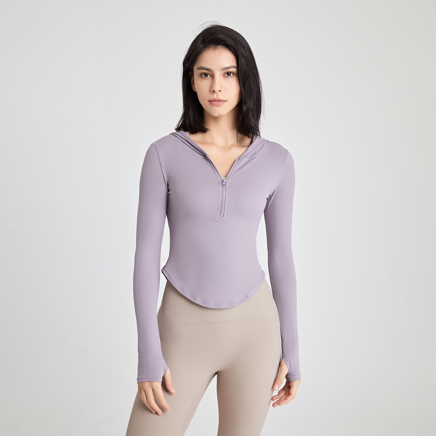 Long-sleeved fitness top with finger loops.