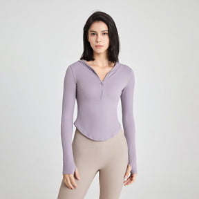 Long-sleeved fitness top with finger loops.