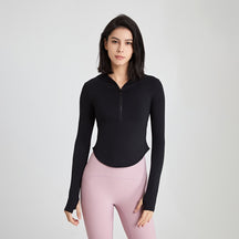 Long-sleeved fitness top with finger loops.