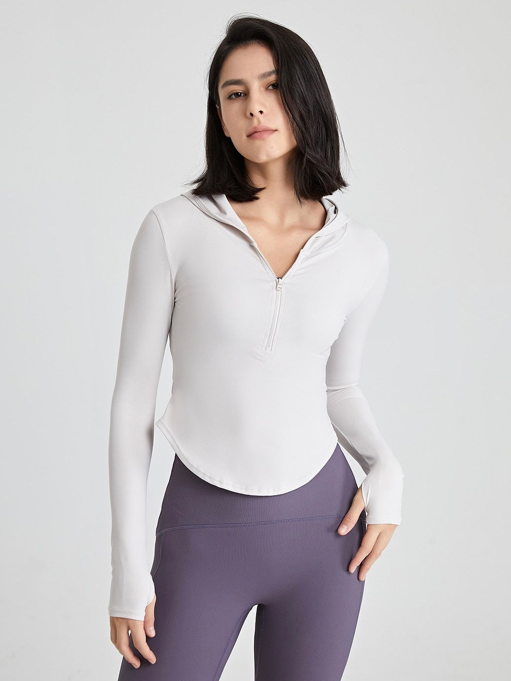 Long-sleeved fitness top with finger loops.